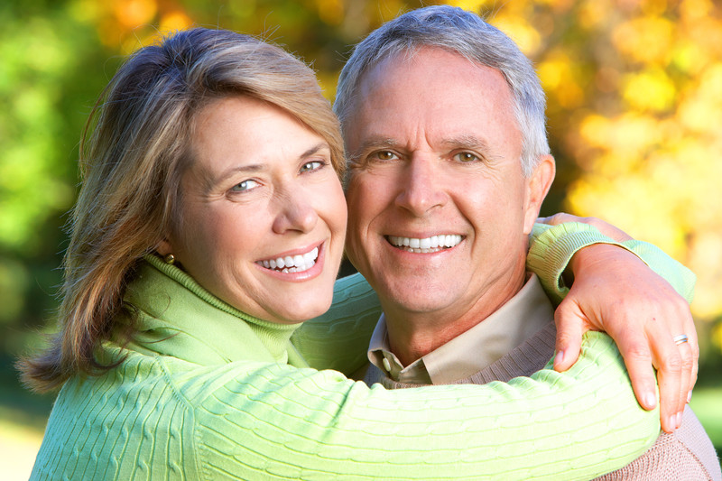 Comparing Dental Implants, Bridges & Dentures
